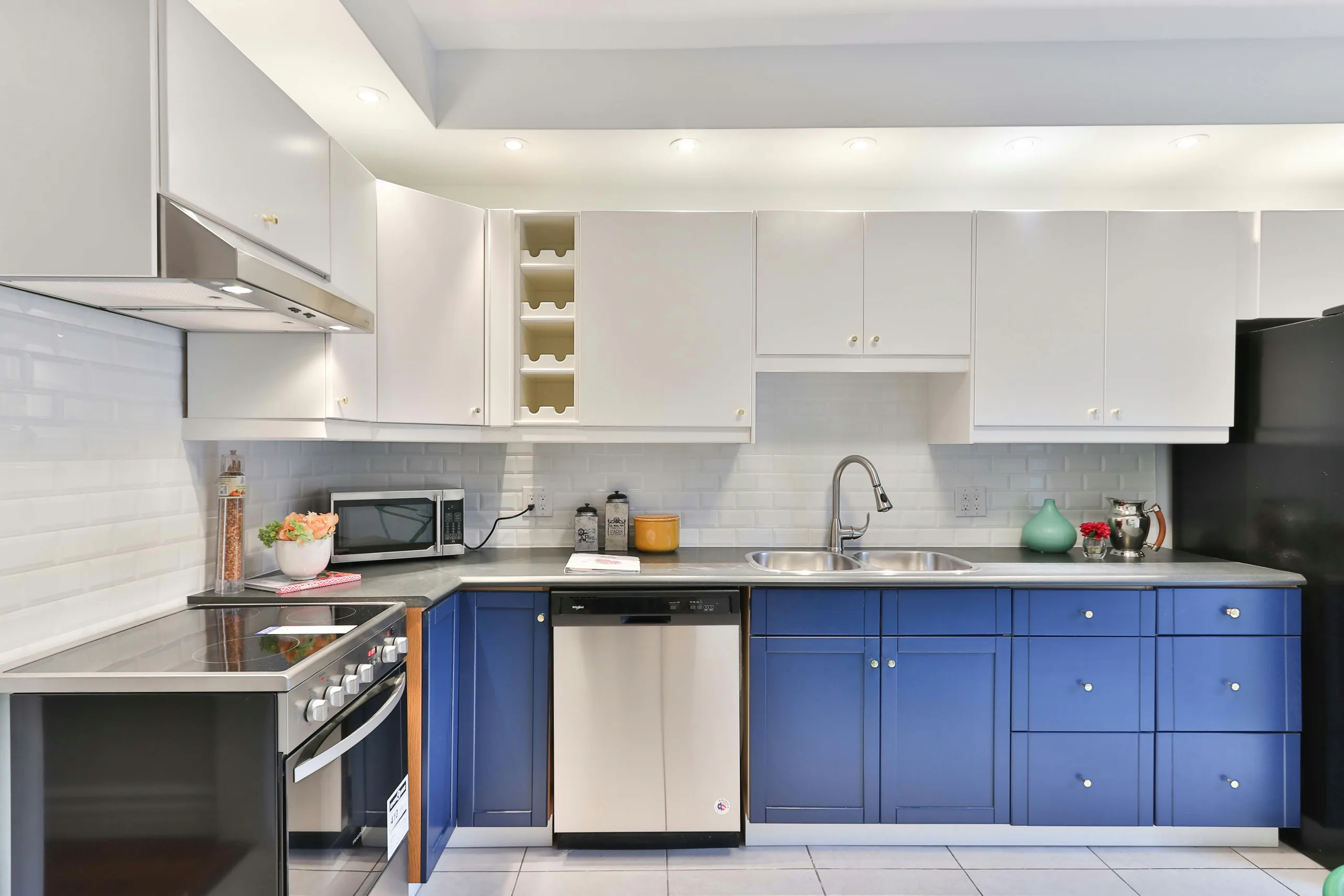 Kitchen with painted blue cabinets