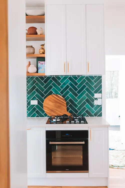 Modern kitchen with grey splashback tiling, kitchen tiling Dublin