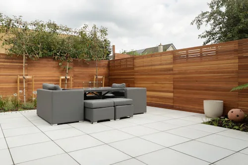 Tiled patio with outdoor furniture, patio tiling Dublin