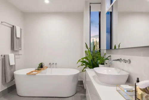 Modern white and grey bathroom tiling project in Dublin
