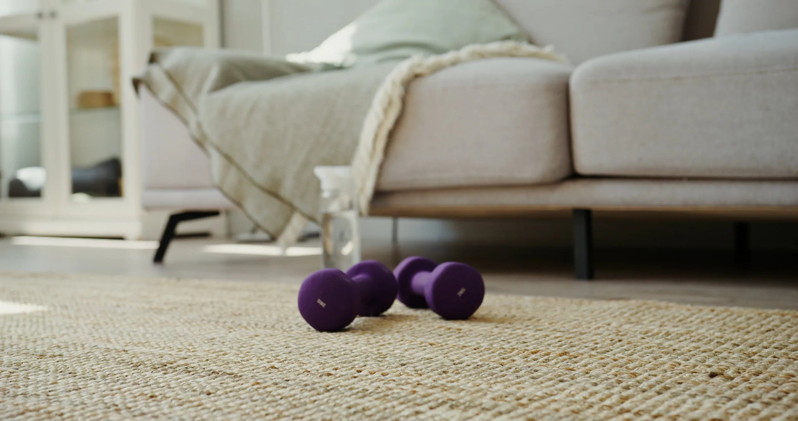 Dumbbells in a home workout space