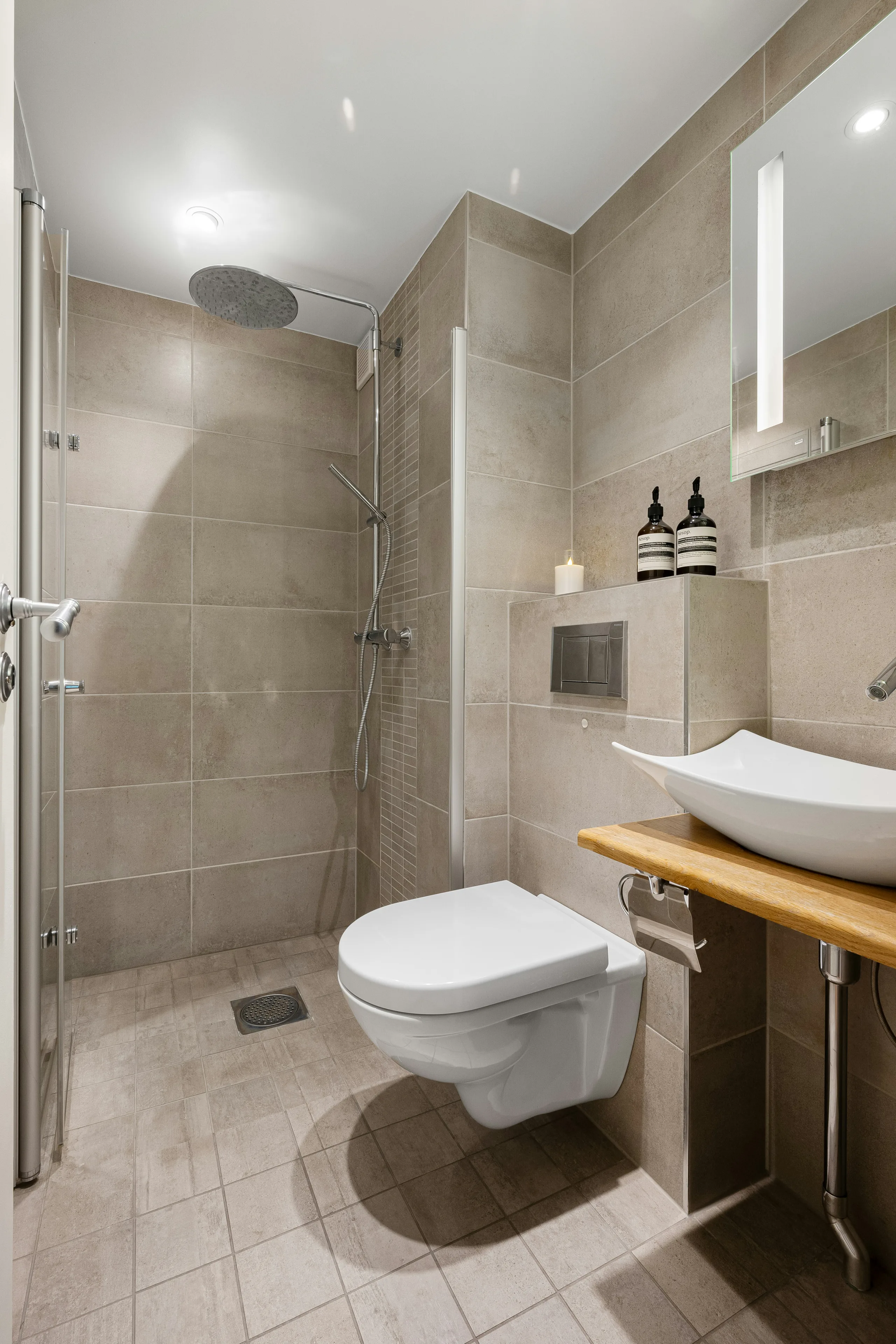 Accessible bathroom with low-threshold shower and clear floor space