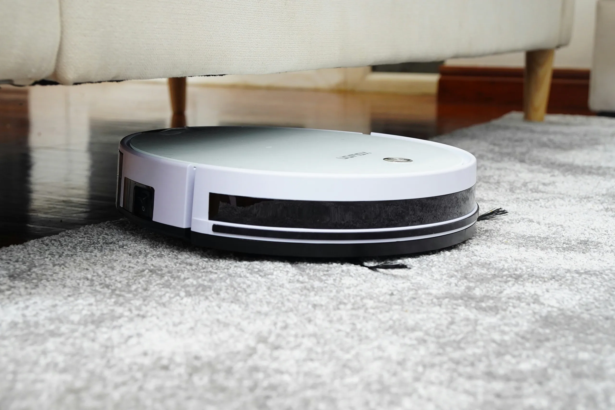 Professional carpet cleaning machine deep cleaning a living room carpet