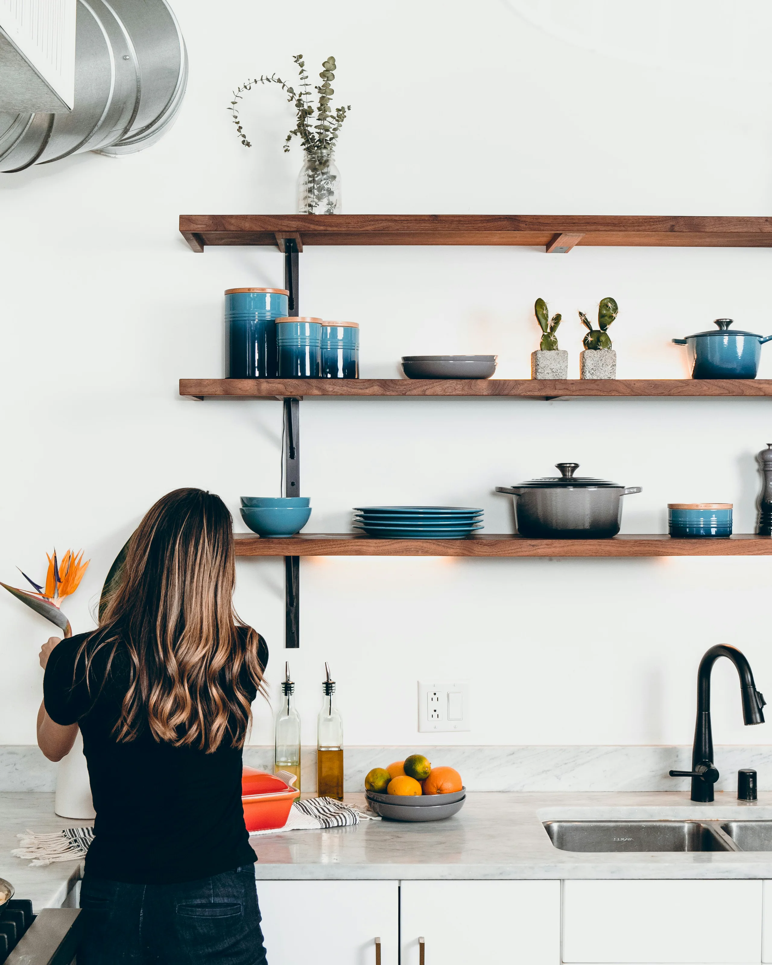 Professional cleaner working in a bright Dublin kitchen