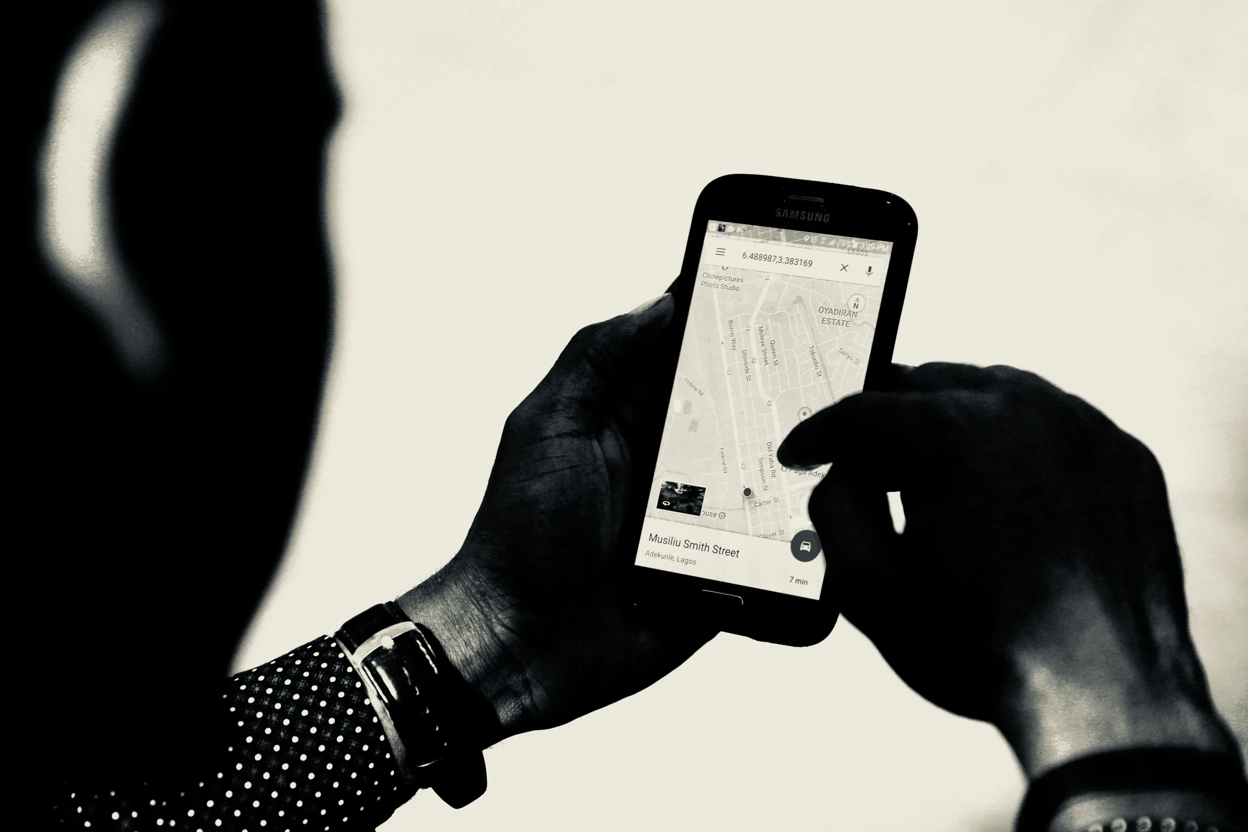 Person checking a business location on Google Maps on their phone
