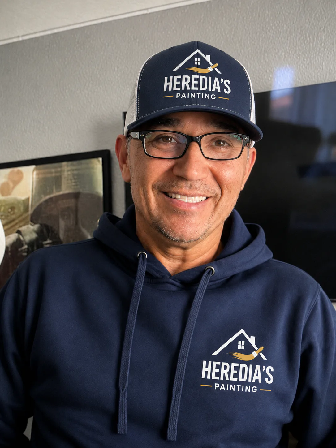 Jorge Heredia, Project Lead, holding a paint sprayer