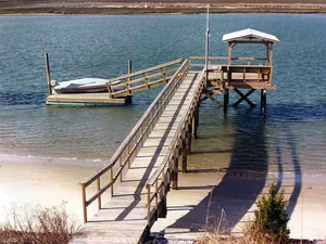 Newly constructed wooden boat dock on the Myrtle Beach coastline, built by Myers Marine Construction LLC