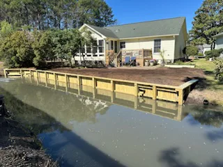 Newly constructed bulkhead protecting a waterfront property.
